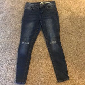 Dark blue fade torn jeans